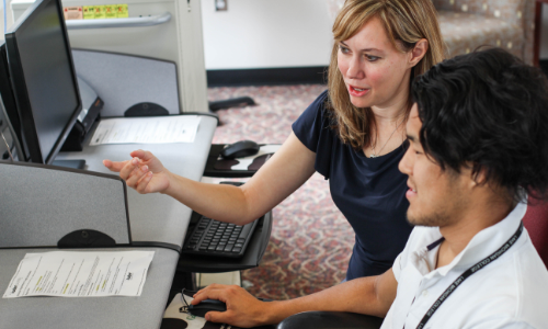 2 students at a PC