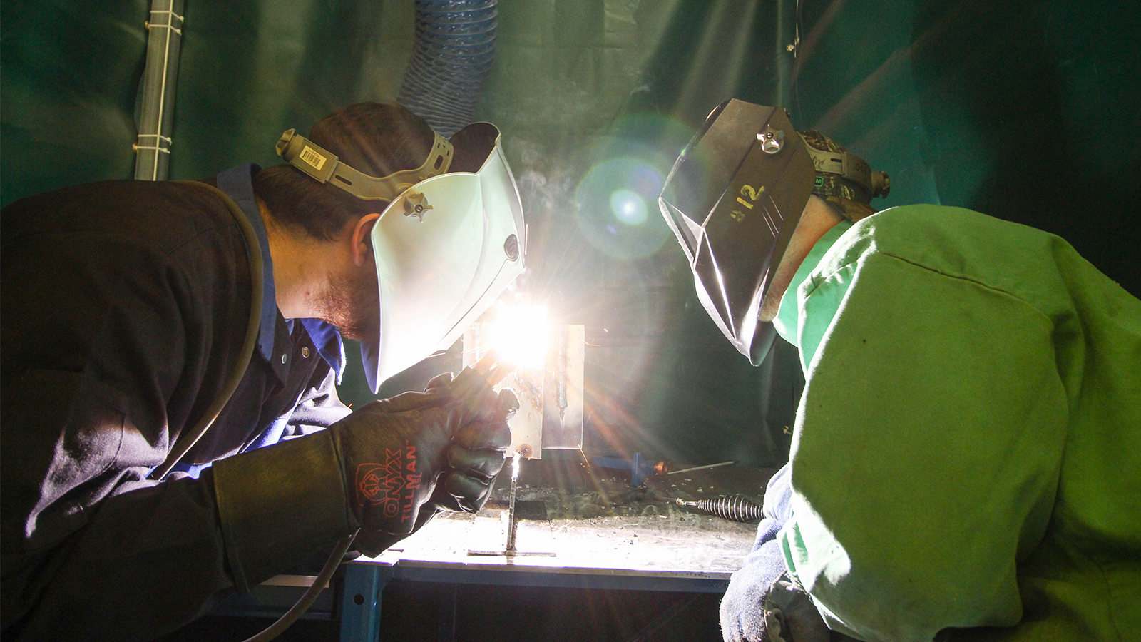 Instructor and student welding