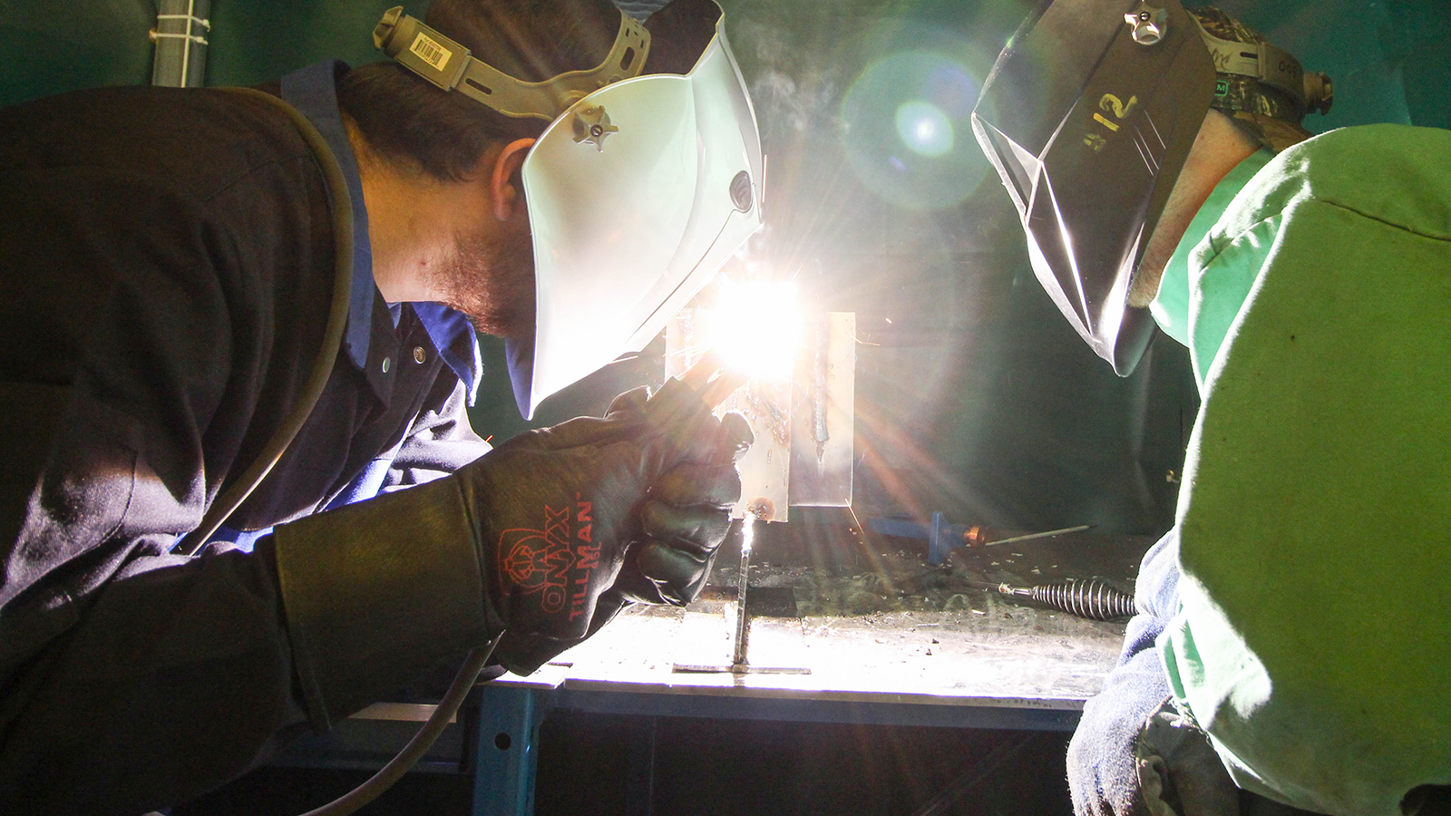 Instructor and student welding