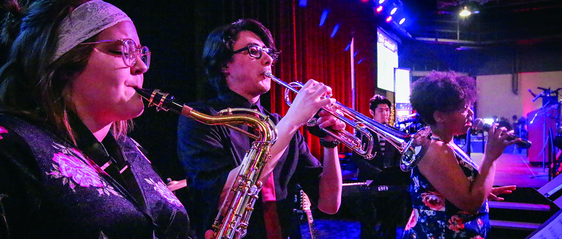 Students perform in the Mendel Center Grand Upton Hall.