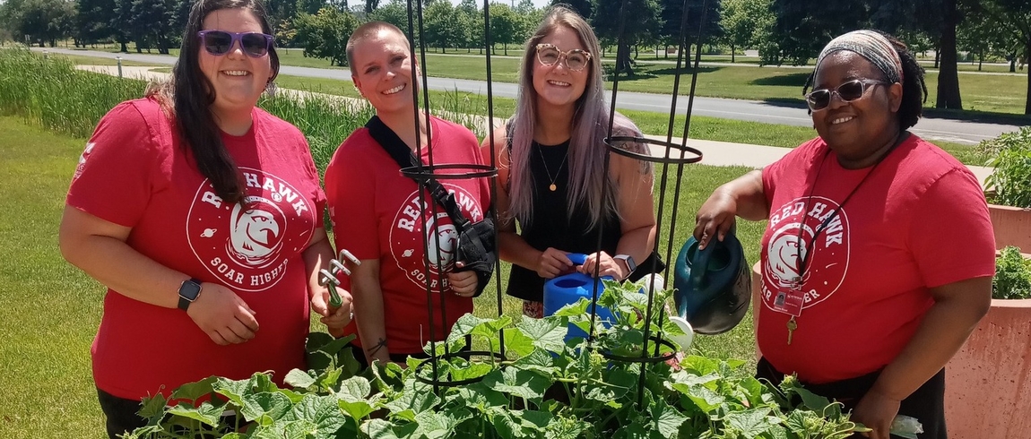 LMC's community garden and a team of volunteers.