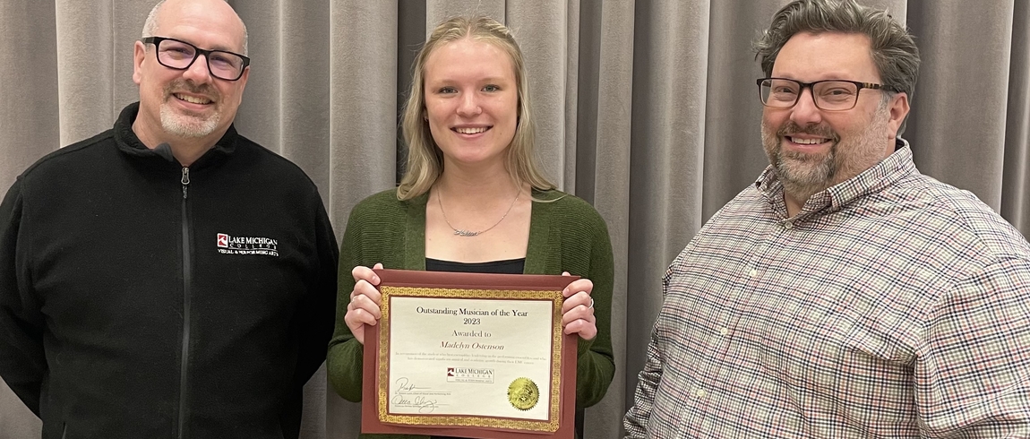 Lake Michigan College Music Faculty Dr. Robert Lunn, left, and Charles Reid, right, pose with Madelyn Ostenson, who was selected as the 2023 Outstanding Musician of the Year.