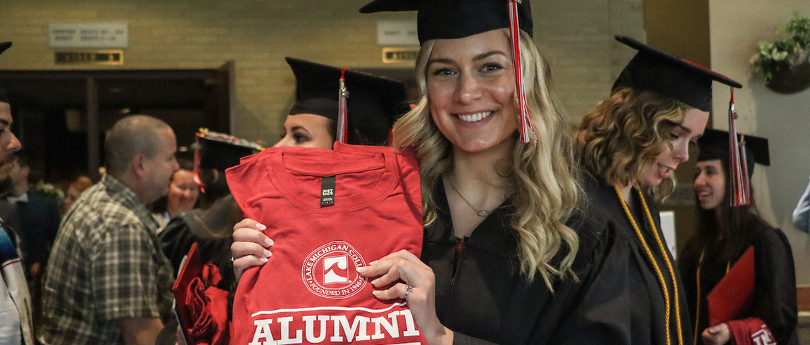 LMC grad with alumni T-shirt