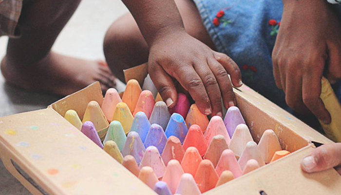 Children playing with chalk