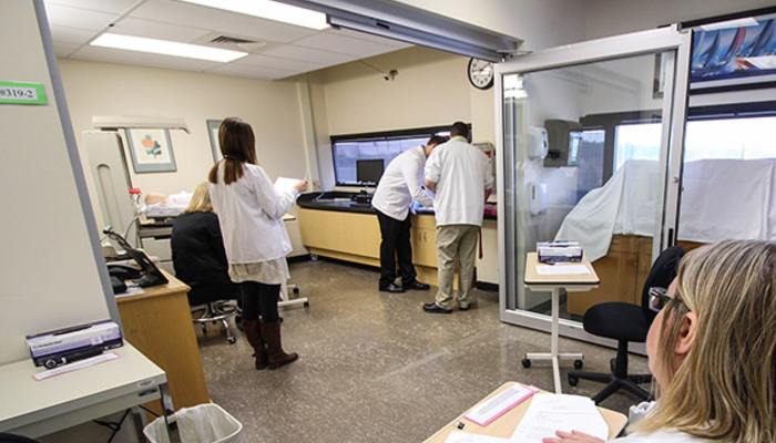 Students in the sim lab