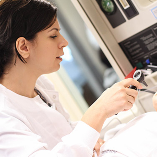 Nursing student working on a mannequin