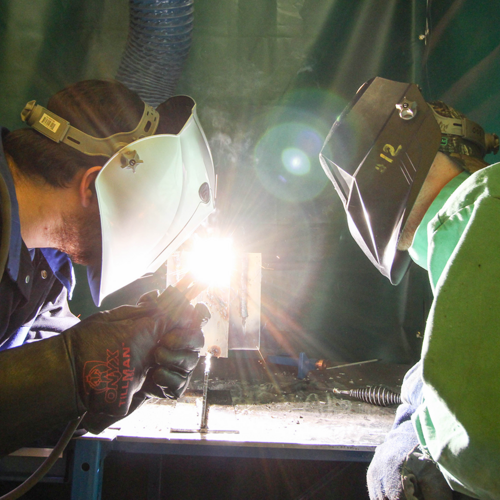 Instructor and student welding